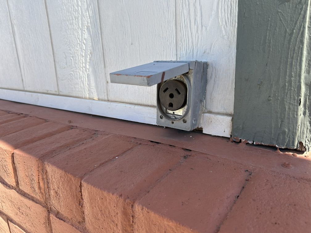 SKP Ranch Lot 82 30A Outlet on side of Casita